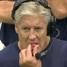 Coach Pete Carroll chewing gum